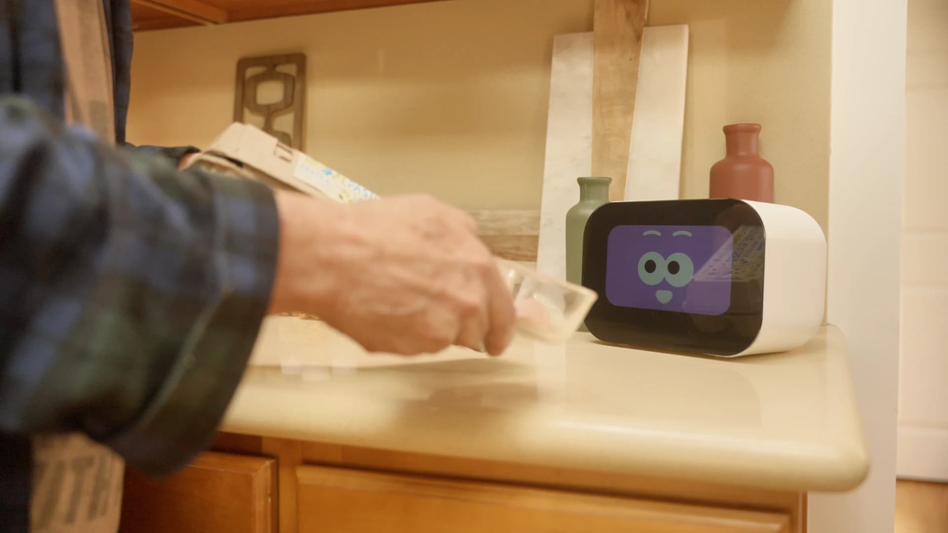 Rhem supporting morning medication reminders and wellness check-ins at home.